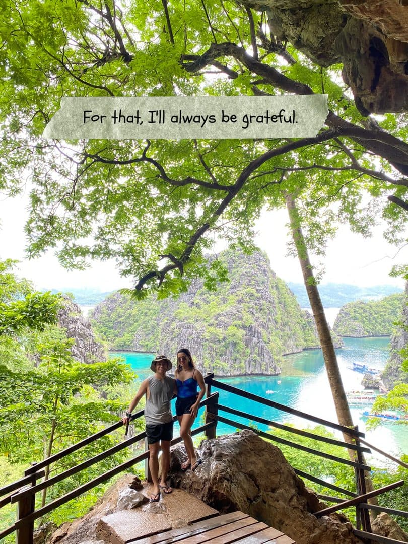 Godfrey and his partner at a viewpoint above the lagoons in Coron